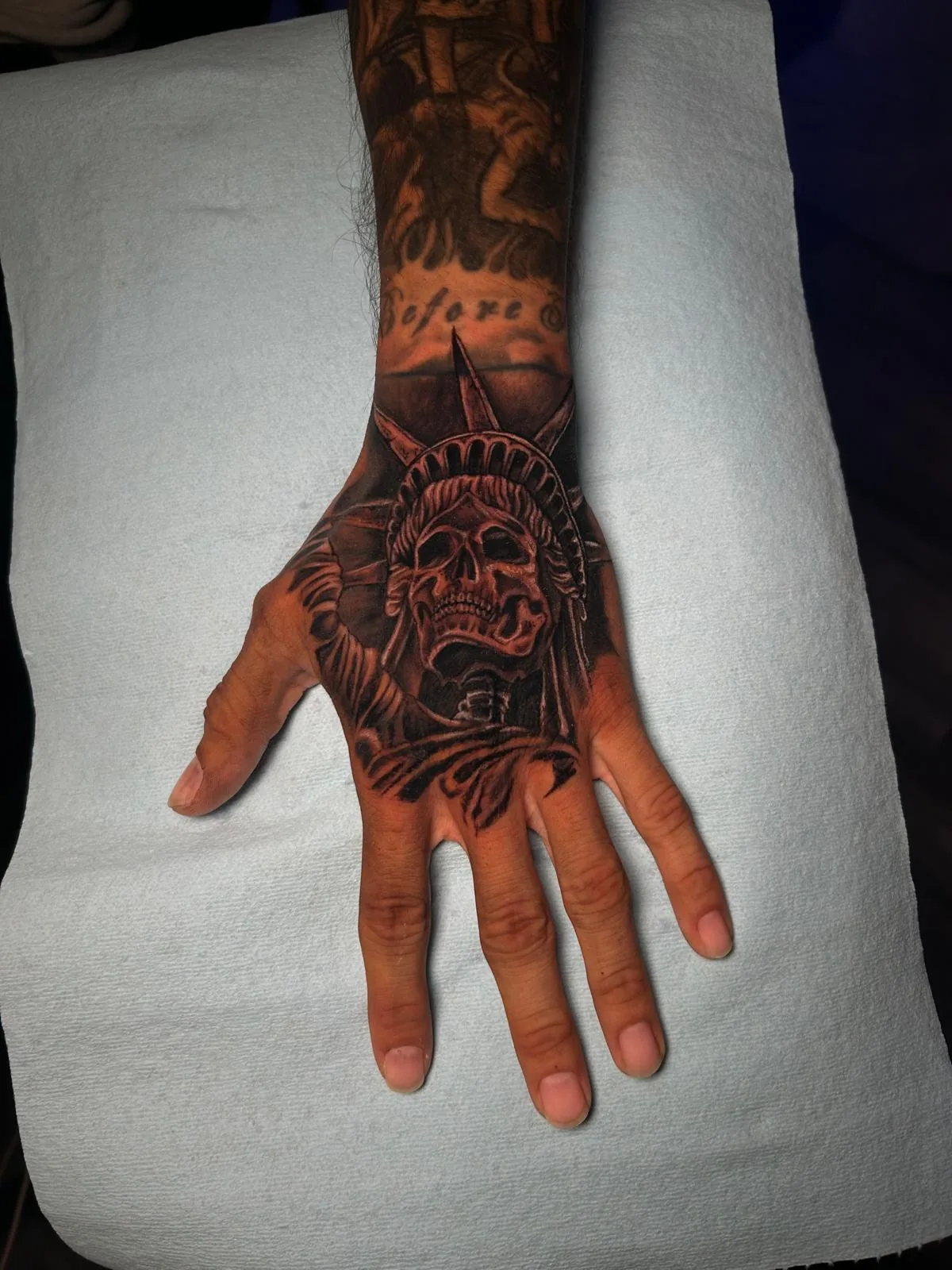 Liberty Skull — realism tattoo by Nemo Tattoo Studio