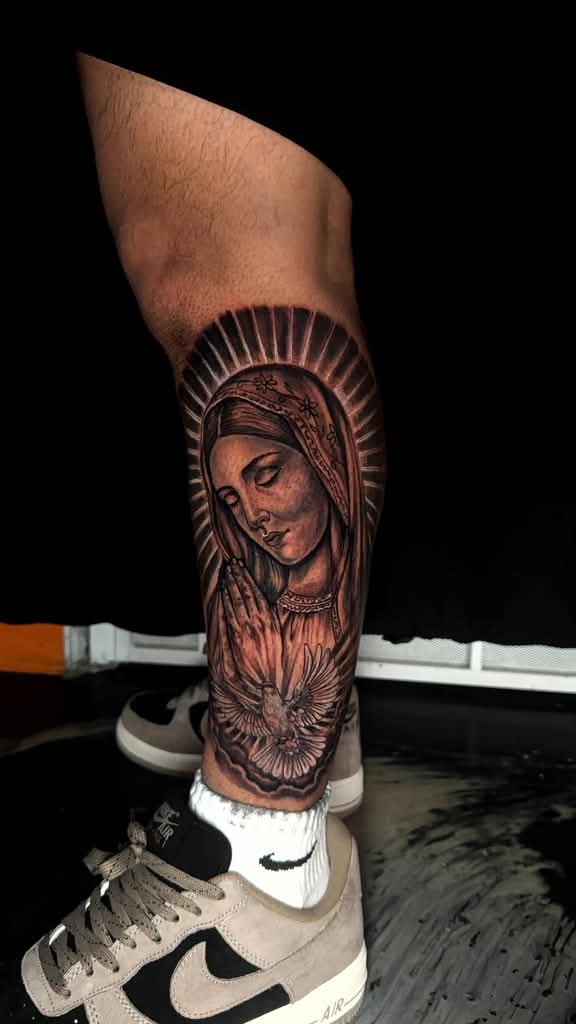Holy Serenity — blackwork tattoo by Nemo Tattoo Studio