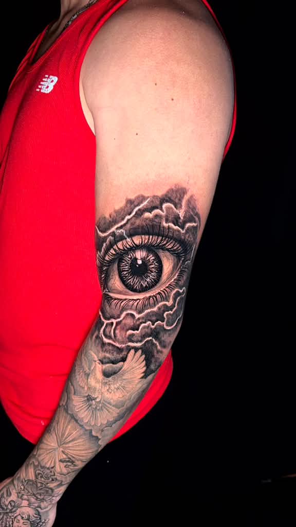 Stormy Gaze — realism tattoo by Nemo Tattoo Studio